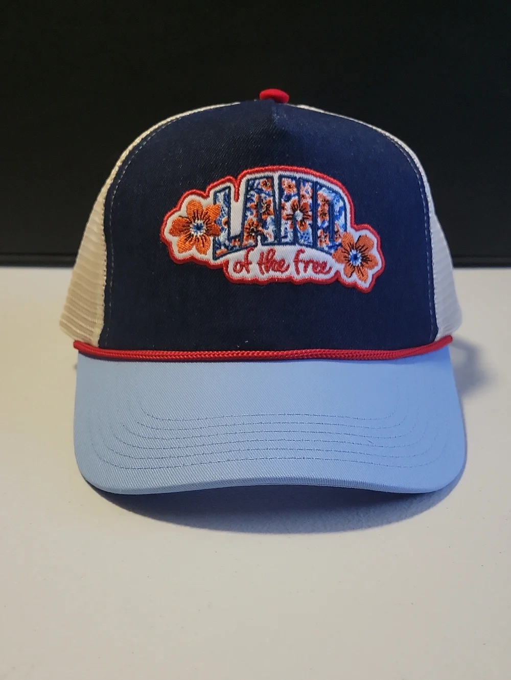 Patriotic Floral Patch Trucker Hat - Navy, Light Blue & Cream. T21